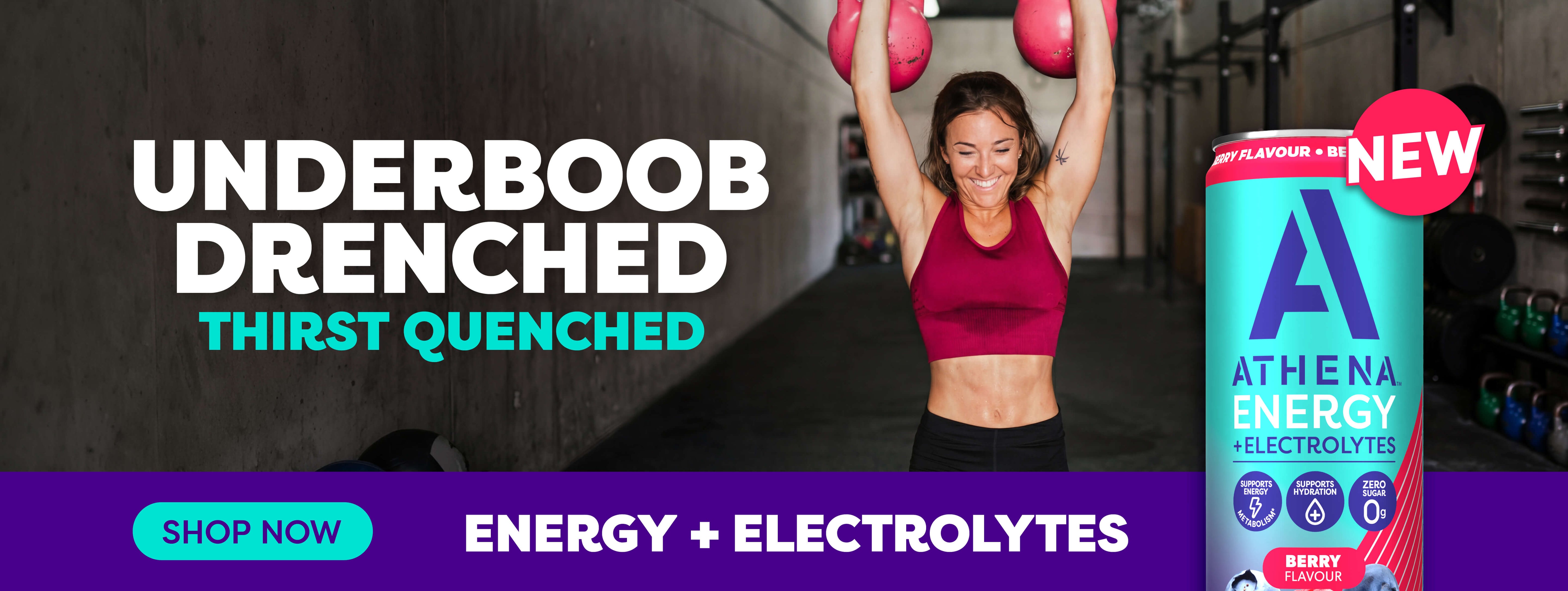 Woman lifting weights with a container of Athena Energy drink mix in a gym setting.